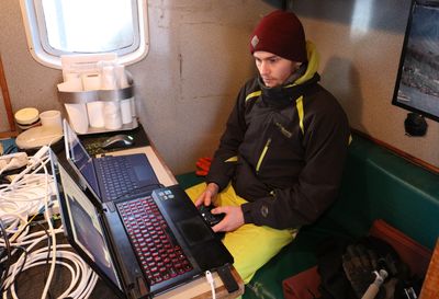 Our pilot, Robert, controlling the ROV with an Xbox controller and a GUI on two different computers, showing data and pictures for the ROV.