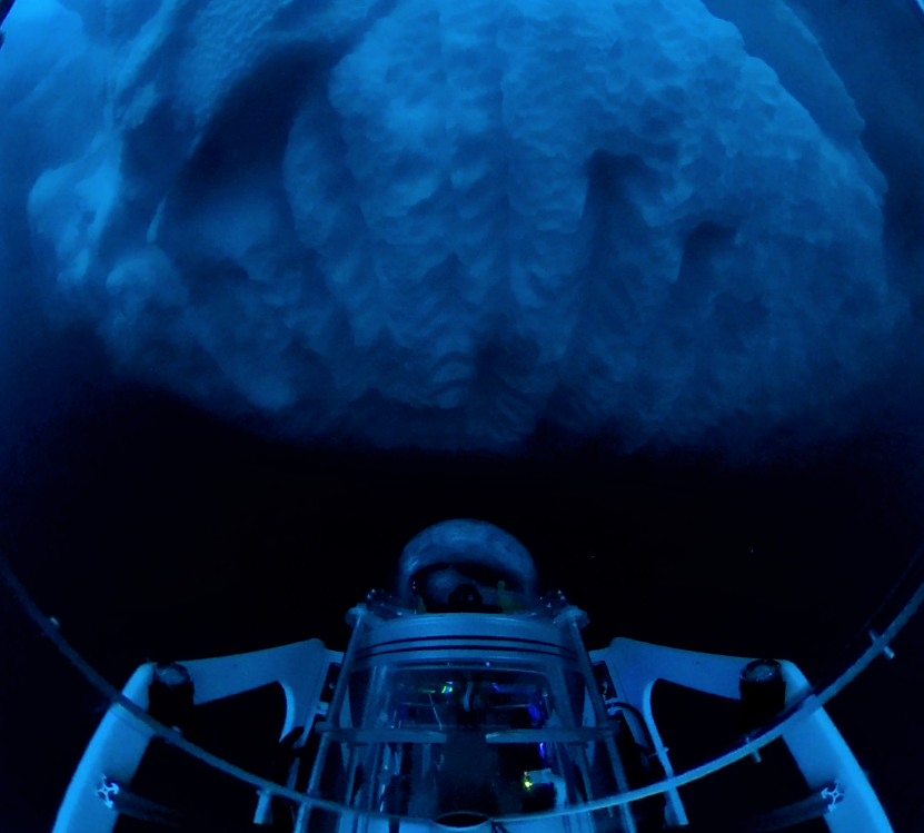 Picture of the ROV and an Iceberg from 360 video captured during a field test at Greenland