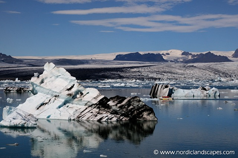 Glacier iceberg with different concentrations of sediment, source www.nordiclandscapes.com