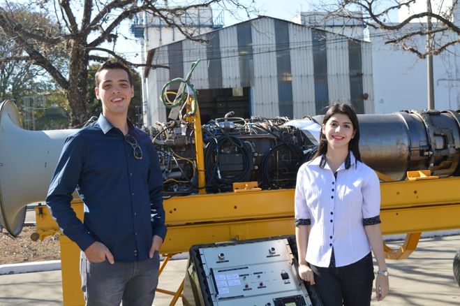 Figure 15 – The two engineering interns at PAMA, Henrique and Mariana, in front of the project. Source: Authors