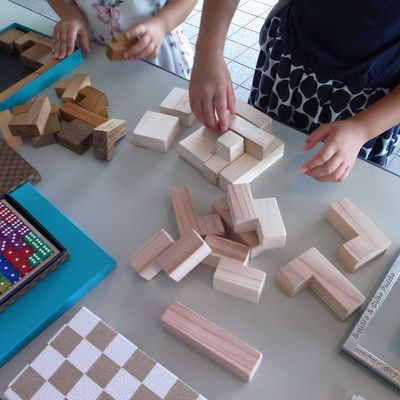 Girls playing wooden blocks